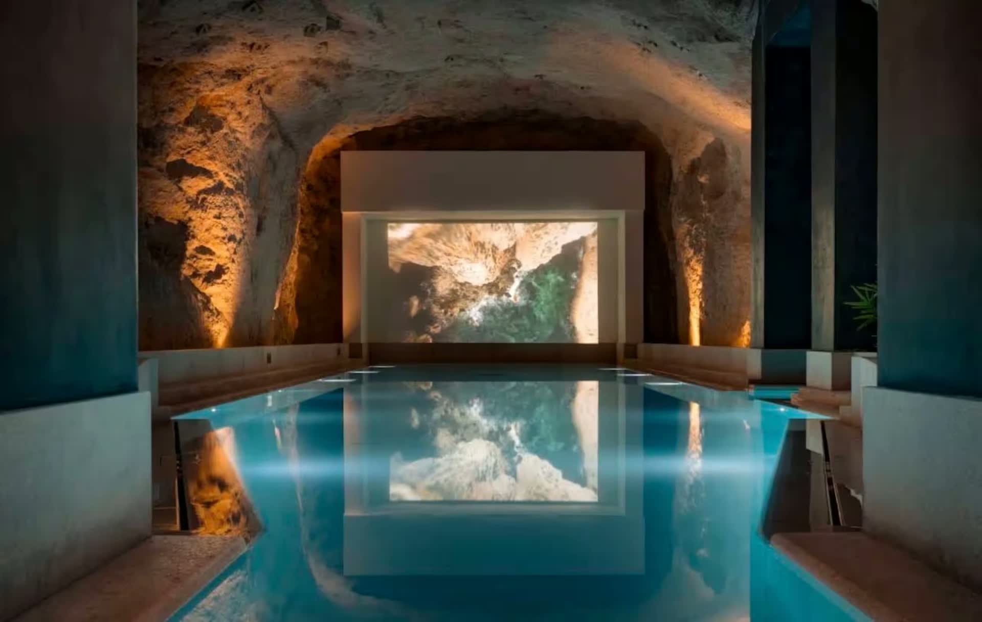 Indoor cave pool of a Solénne Luxe residence